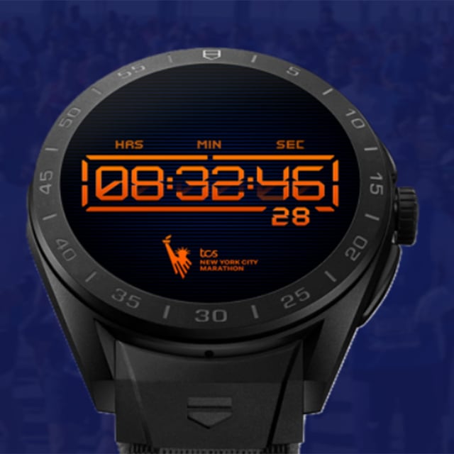 Black TAG Heuer Connected watch showing an orange digital timer and New York City Marathon logo