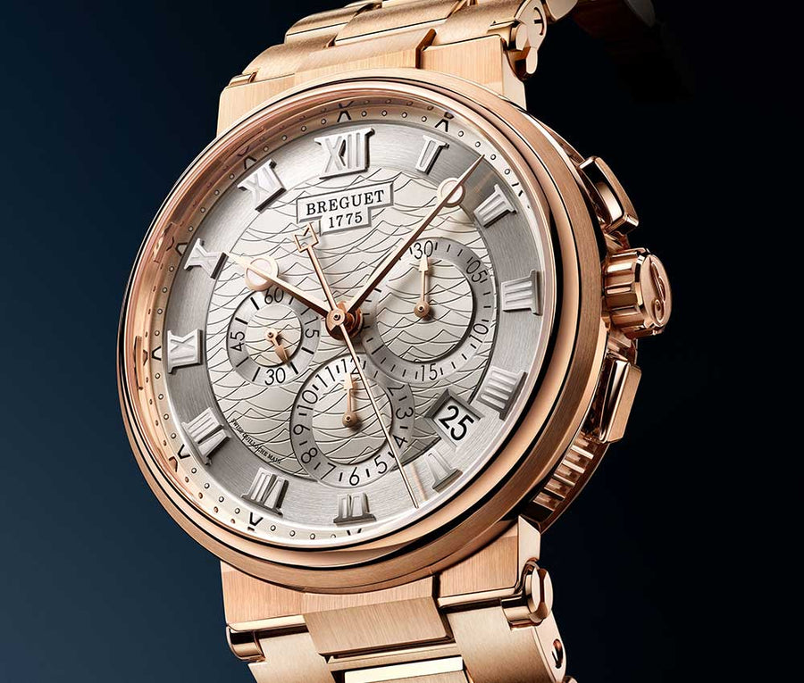 Breguet Marine chronograph with a silver dial, Roman numerals and a rose-tone bracelet